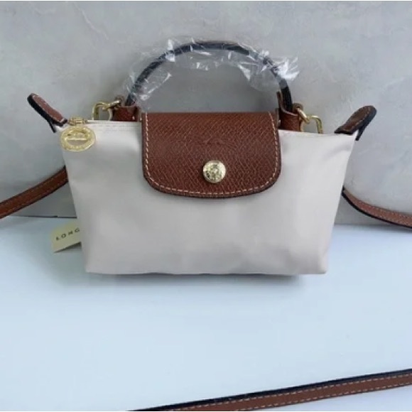 Longchamp Handbags - Longchamp Mini Bag in Cream and Brown